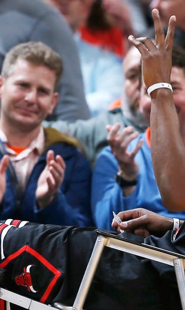 Bulls' Jimmy Butler taken off court in wheelchair after hard fall